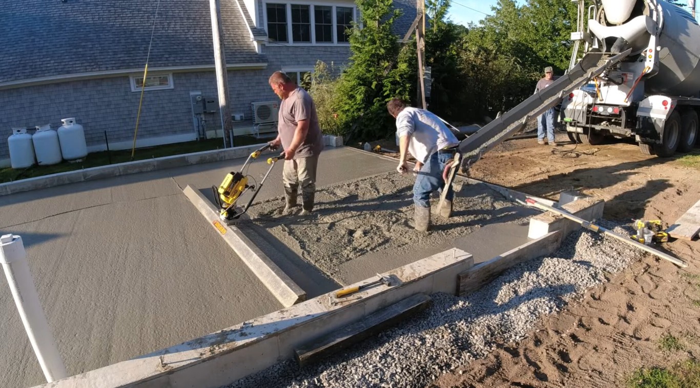Professional concrete contractors pouring concrete in Watsonville, CA